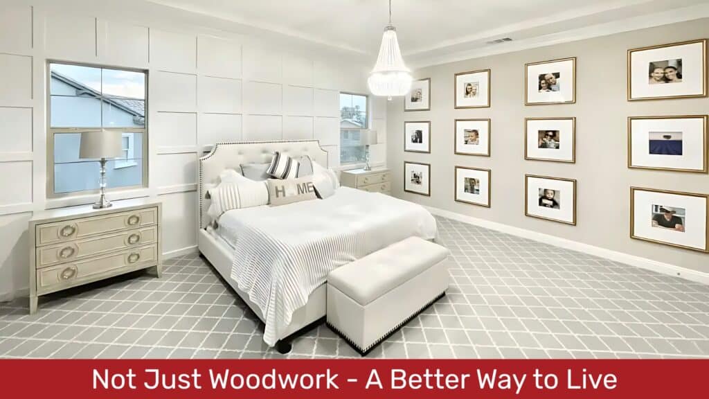 Elegant master bedroom with white paneled accent walls,